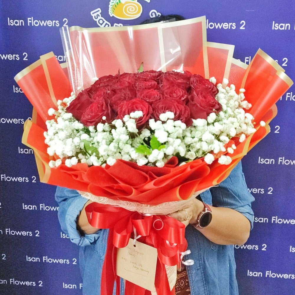 24 big red roses in red round bouquet a