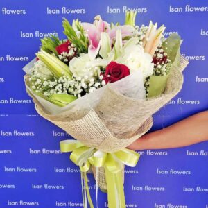 White & Pink Lilies with Big Roses in Brown - Round Bouquet