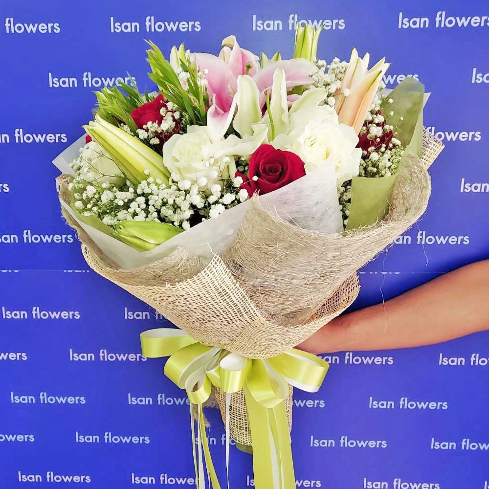 6 white roses 6 red roses and 3 lily stems round bouquet pre