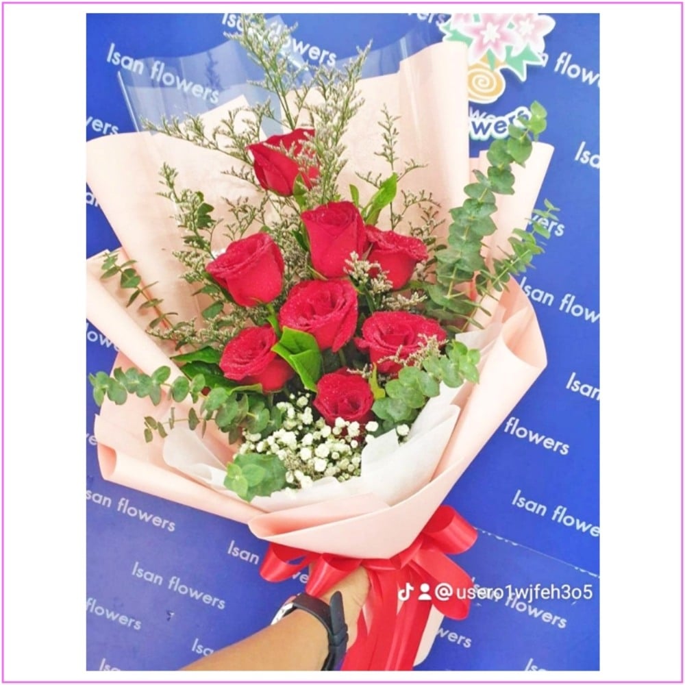 8 big red roses in pink tall bouquet a pre