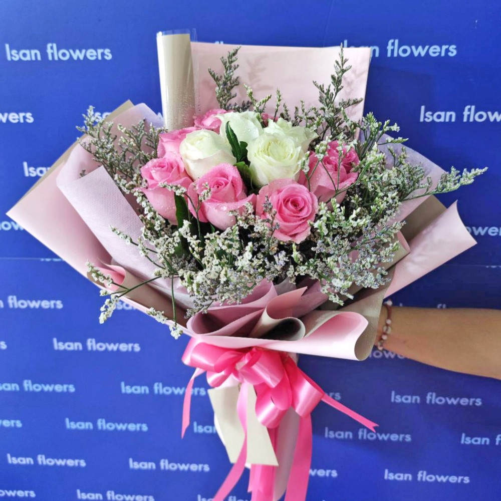 8 pink and 4 white big roses in pink round bouquet a